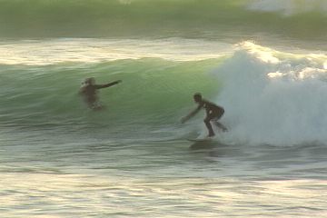 ride down the wave face with all the speed that you can