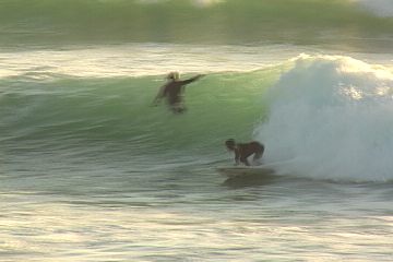 Bend your knees slightly, and lean on to your toe side edge