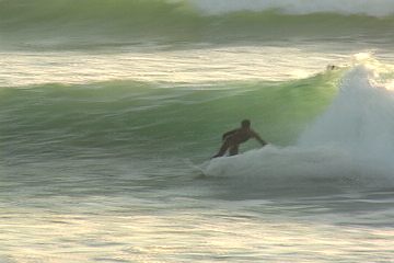 Start your bottom turn as soon as you reach the flats